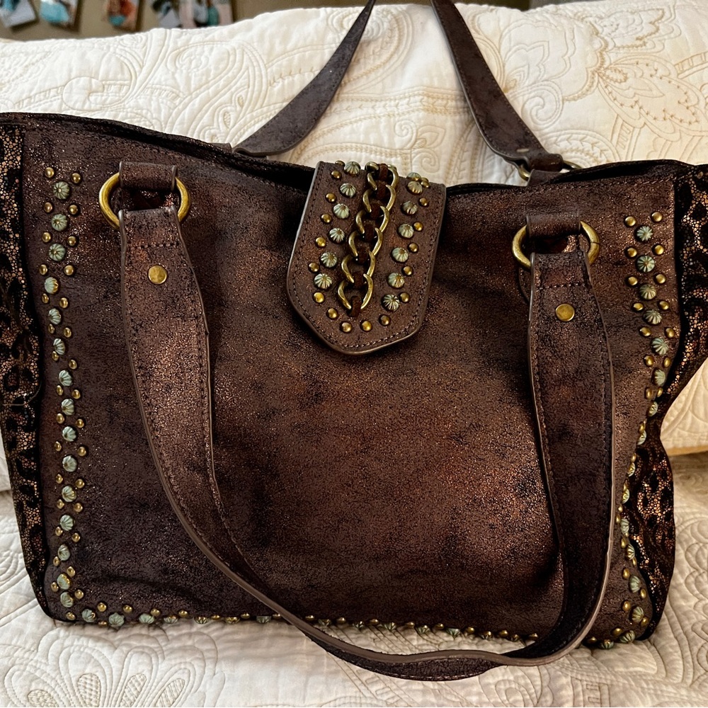 Montana West Leopard shoulder conceal carry handbag.